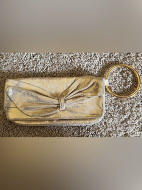 Sabina New York Gold leather clutch